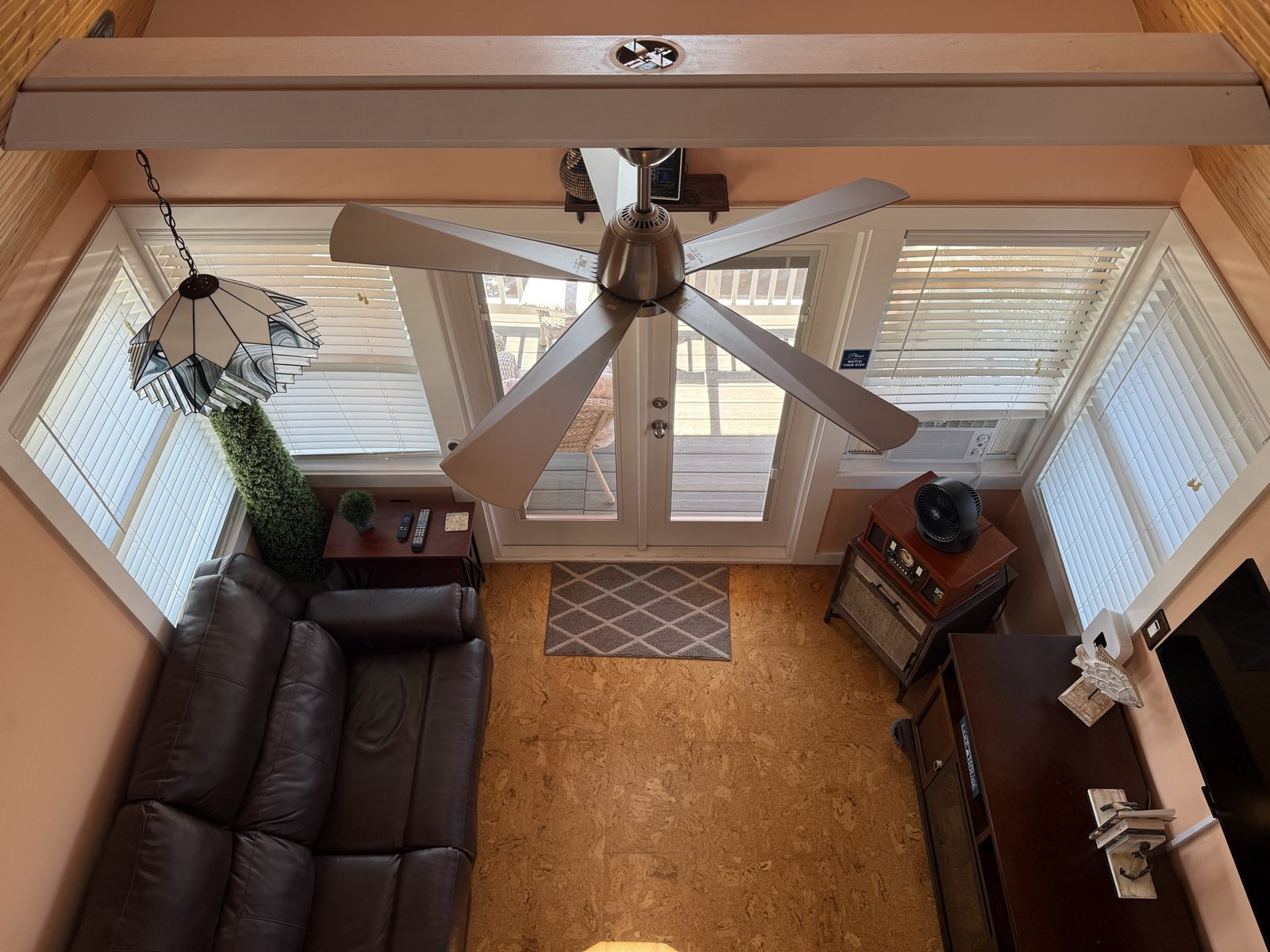Open-plan living space viewed from the loft