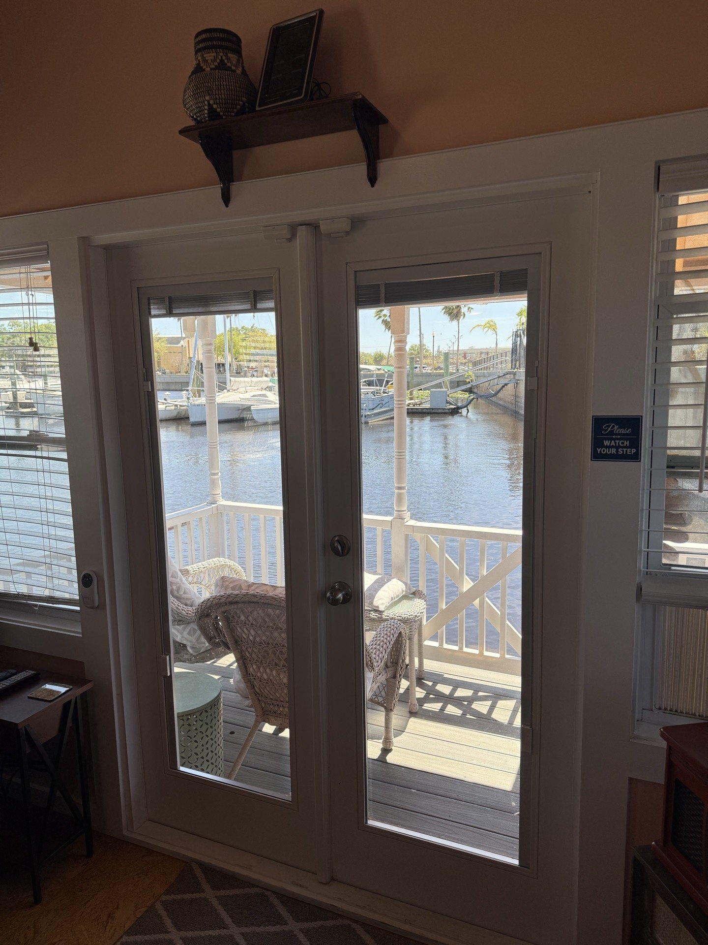 French doors opening to the waterfront porch