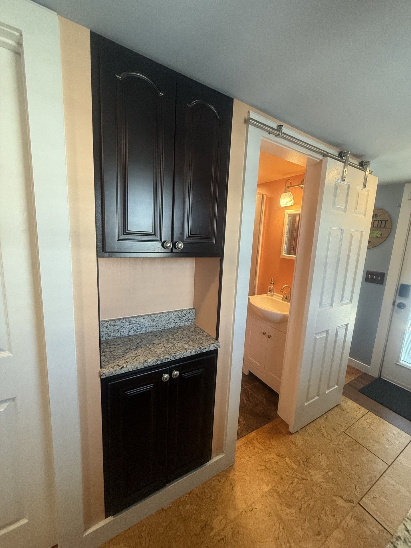 Built-in pantry and full bathroom